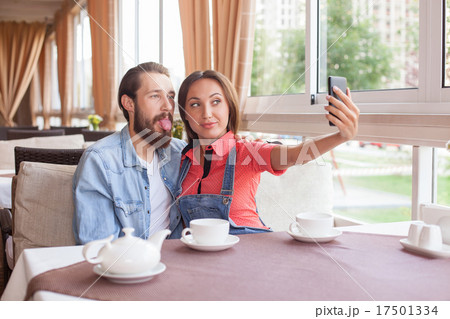 Attractive married couple is photographing 17501334