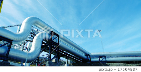 IndustrialSteel pipelines valves against blue sky 17504887