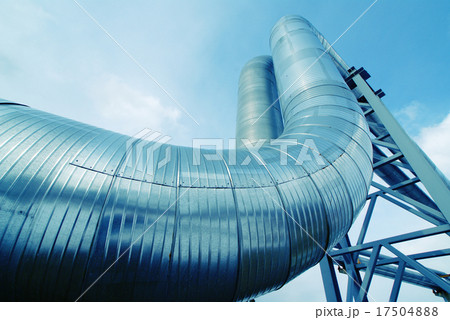 IndustrialSteel pipelines valves against blue sky 17504888