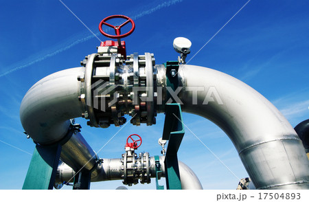 IndustrialSteel pipelines valves against blue sky 17504893