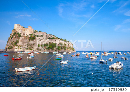 Ischia port, Aragonese Castle and small boats 17510980