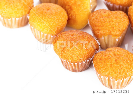 Delicious mini muffins on a white background 17512255