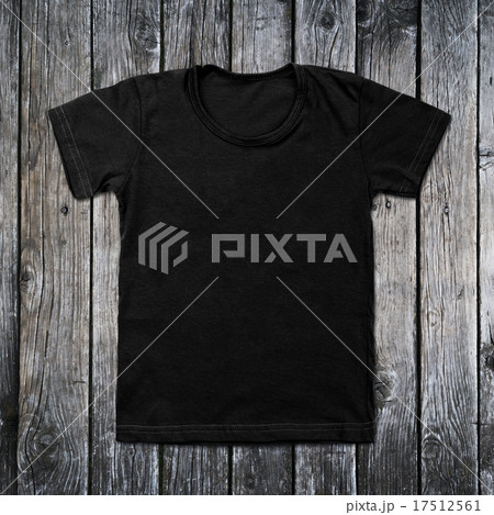 Black blank t-shirt on wooden background Black blank t-shirt on wooden background 17512561