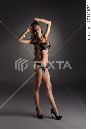 Model with perfect body advertises erotic lingerie 17512870