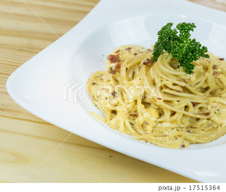 Spaghetti Cabonara with creamy sauce on wooden table 17515364