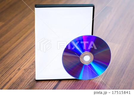 Blank compact disc with cover on wood background ground Blank compact disc with cover on wood background ground 17515841