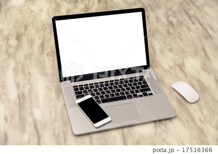 laptop with smart phone on table laptop with smart phone on table 17516366