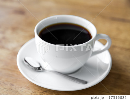 Coffee in white cup on wood table 17516823