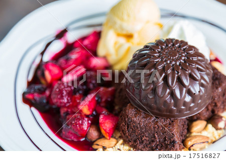 Chocolate cake with fruit peach, black currant, blueberry, apple 17516827