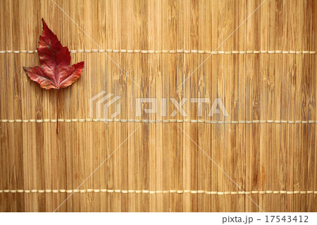 background dry yellow leaves on a wooden background background dry yellow leaves on a wooden background 17543412