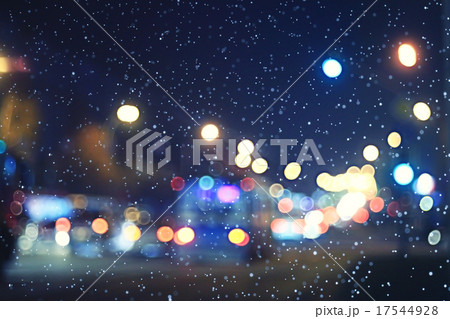 blurred night background city traffic road city lights winter snow glare 17544928