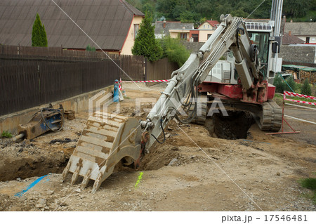 excavator ploughshare on trench - constructing excavator ploughshare on trench - constructing 17546481