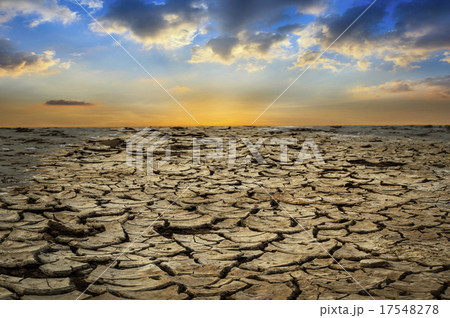 dry and cracked land from natural disaster scene 17548278