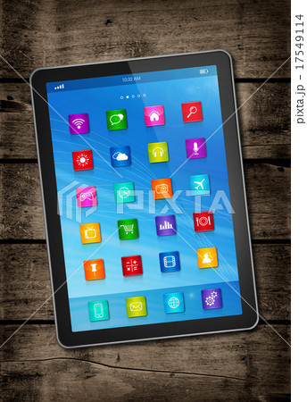 Digital tablet PC on a dark wood table Digital tablet PC on a dark wood table 17549114