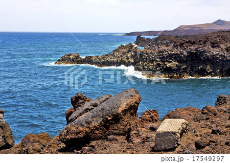 hervideros brown rock in white coast lanzar  17549297