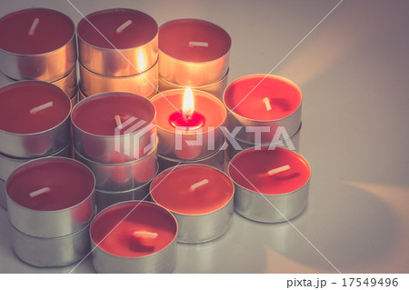 Red candles on dim light with retro style 17549496