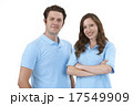 Studio Portrait Of Staff Wearing Uniform Against White Backgroun 17549909