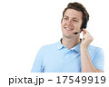 Man Answering Calls In Customer Service Department 17549919
