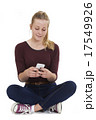 Studio Shot Of Teenage Girl Sending Text Message 17549926