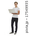Full Length Studio Shot Of Teenage Boy Using Laptop 17549935