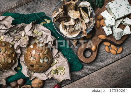 Autumn harvest nuts mushrooms cheese bread buns 17550264
