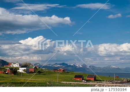 scenic view of fjord, snow mountains and village, Norway, Lofoten 17550394