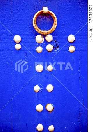 rusty       nail dirty   in the blue wood door and 17553679