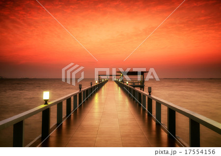 Wood bridge along at island 17554156