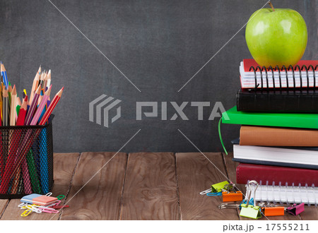 School and office supplies on classroom table 17555211