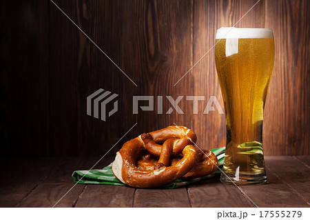 Lager beer glass and pretzel Lager beer glass and pretzel 17555279