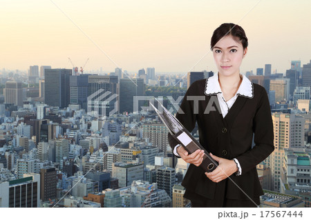 business woman holding folder documents with city 17567444
