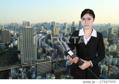 business woman holding folder documents with city 17567445