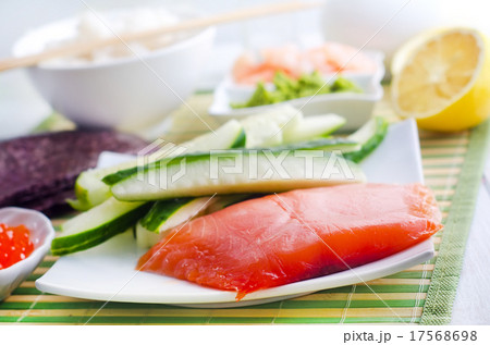 ingredients for sushi, sakmon and cucumber ingredients for sushi, sakmon and cucumber 17568698