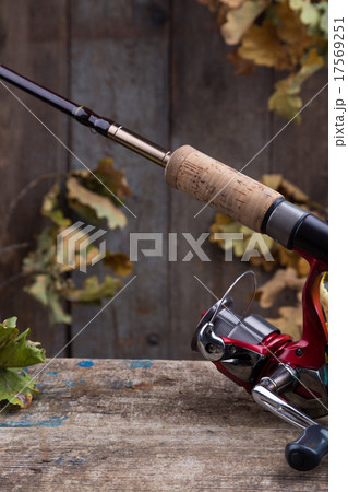 fishing tackles on old wooden board 17569251