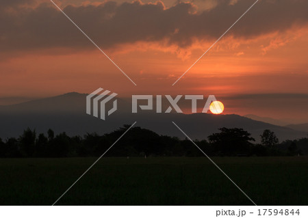 sunset over a mountain sunset over a mountain 17594844