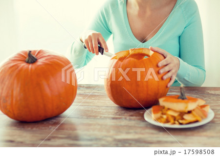 close up of woman with pumpkins at home close up of woman with pumpkins at home 17598508