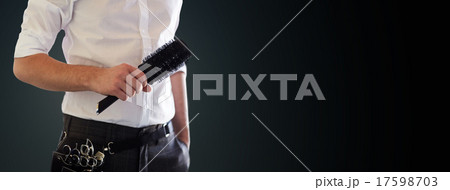 close up of male stylist with brush at salon close up of male stylist with brush at salon 17598703