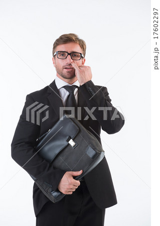Businessman picking his nose 17602297