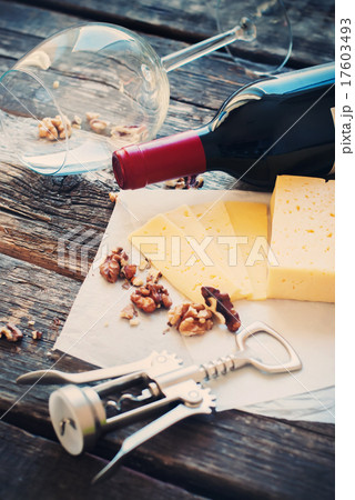 Still Life with Wine, Walnuts, Cheese and Opener 17603493