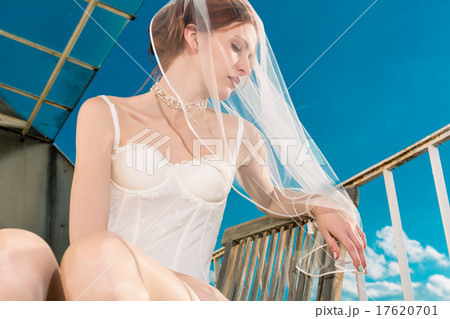 Bride in lingerie for her wedding dreaming 17620701