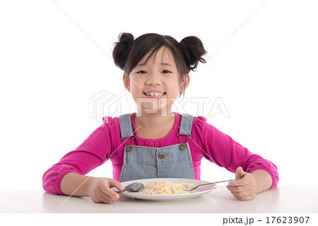 Cute asian girl eating Spaghetti Carbonara 17623907