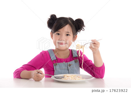 Cute asian girl eating Spaghetti Carbonara 17623922