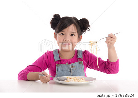 Cute asian girl eating Spaghetti Carbonara Cute asian girl eating Spaghetti Carbonara 17623924
