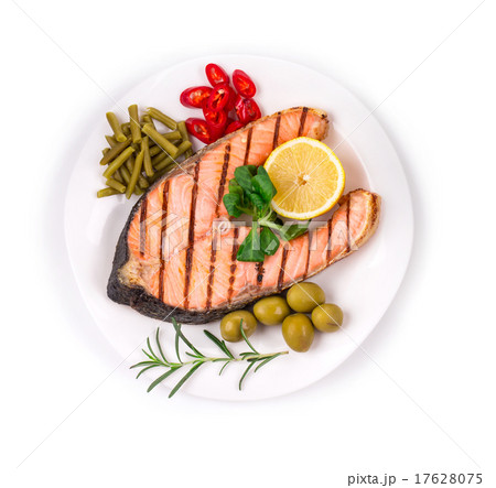Grilled salmon steak with vegetables on plate. Grilled salmon steak with vegetables on plate. 17628075
