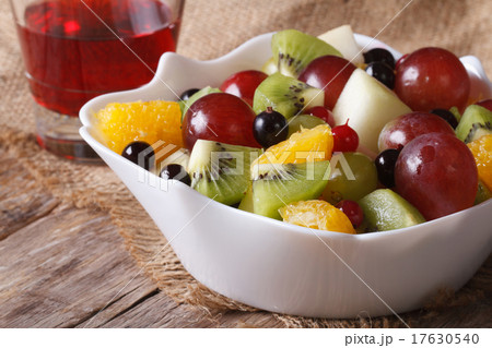 Fruit salad and grape juice close up. horizontal Fruit salad and grape juice close up. horizontal 17630540