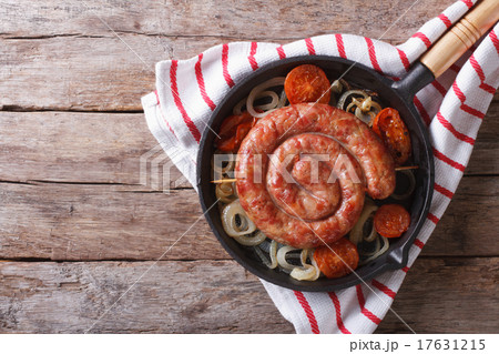 Grilled sausage in a pan. horizontal top view Grilled sausage in a pan. horizontal top view 17631215