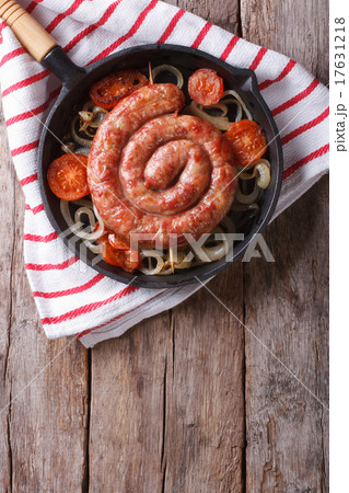 Grilled sausage in a pan. Vertical top view 17631218