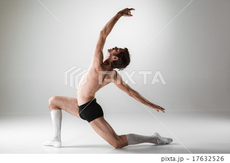 The young attractive modern ballet dancer on white background 17632526