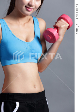 Sport woman is lifting weights Sport woman is lifting weights 17633674
