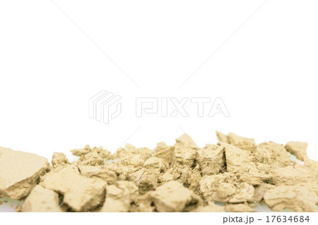 Crushed yellow eyeshadows on white background Crushed yellow eyeshadows on white background 17634684